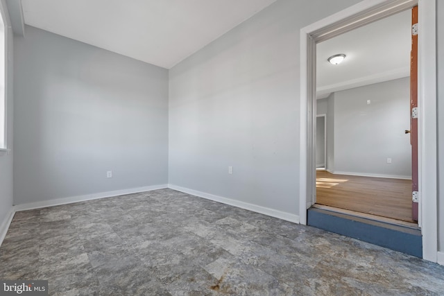 spare room featuring hardwood / wood-style flooring