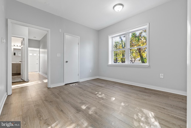 empty room featuring light hardwood / wood-style floors