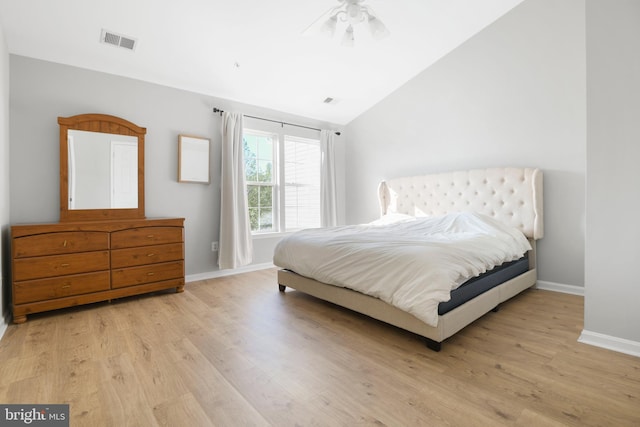 9404 Brigadoon Way, Frederick, MD 21704 - bedroom featuring a ceiling fan, visible vents, vaulted ceiling, baseboards, and light wood-style flooring