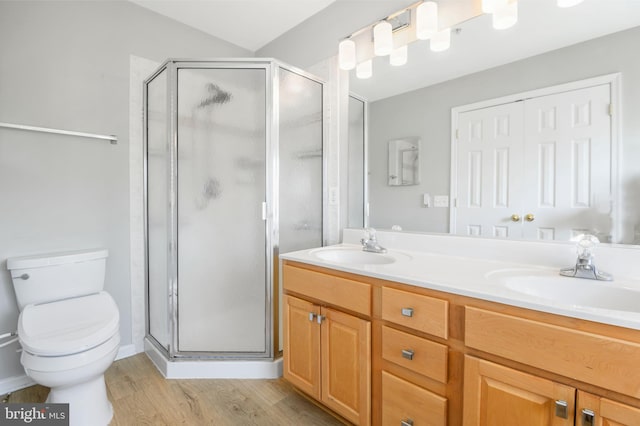 9404 Brigadoon Way, Frederick, MD 21704 - full bath with double vanity, a sink, wood finished floors, and a shower stall