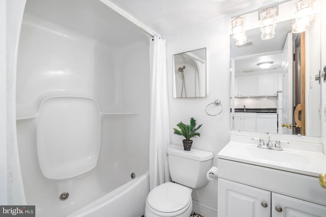 full bathroom with vanity, toilet, and shower / tub combo