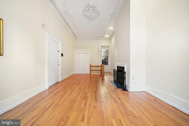 unfurnished living room with light hardwood / wood-style flooring