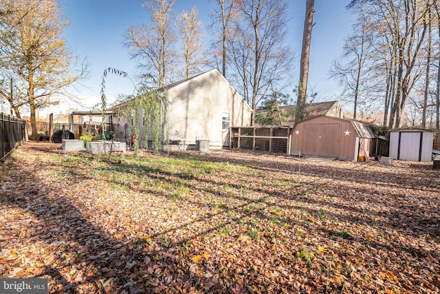 view of yard with a storage unit