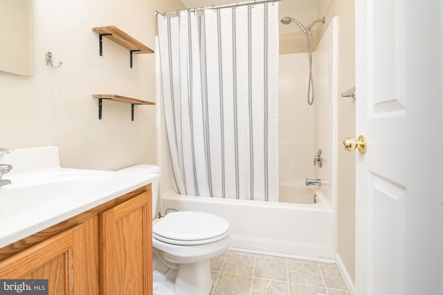 full bathroom with tile patterned floors, vanity, toilet, and shower / tub combo