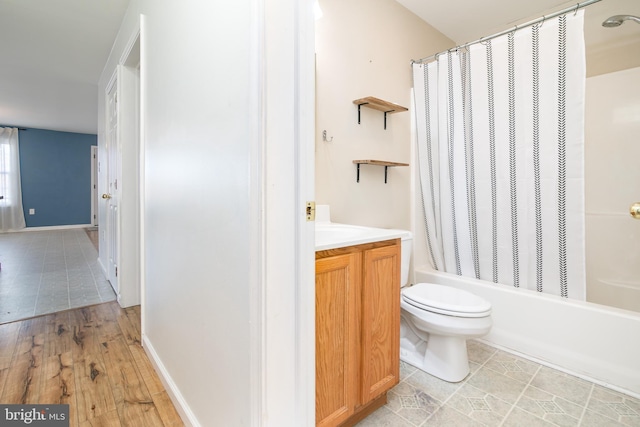 full bathroom with vanity, wood-type flooring, shower / bath combo, and toilet