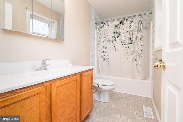 full bathroom featuring shower / bathtub combination with curtain, tile patterned flooring, vanity, and toilet