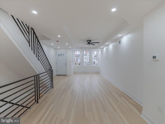 interior space featuring ceiling fan and light wood-type flooring