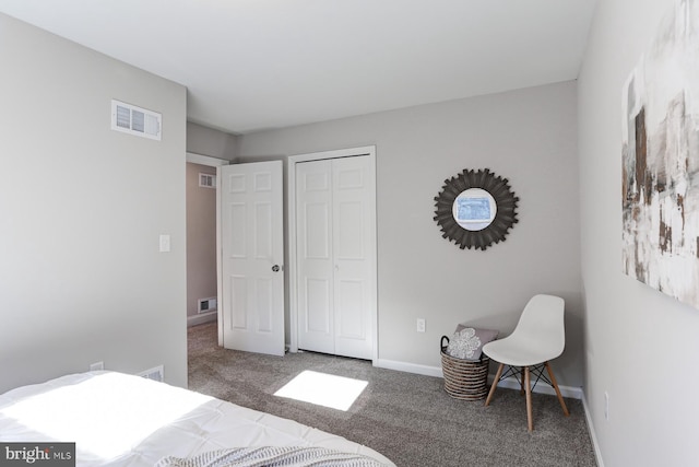 carpeted bedroom with a closet