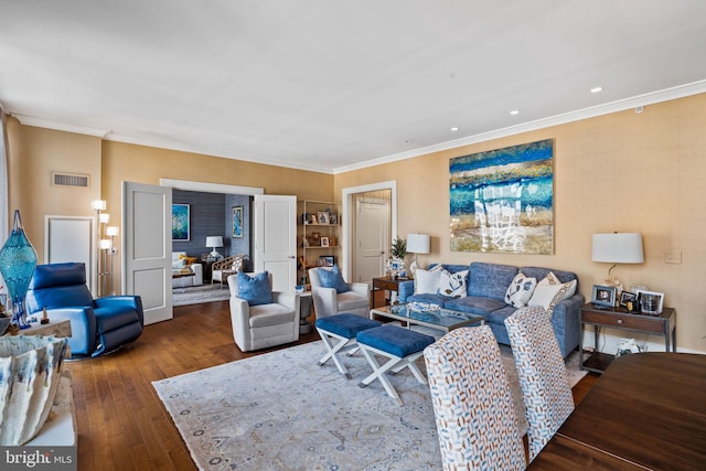 living room featuring crown molding and dark hardwood / wood-style flooring