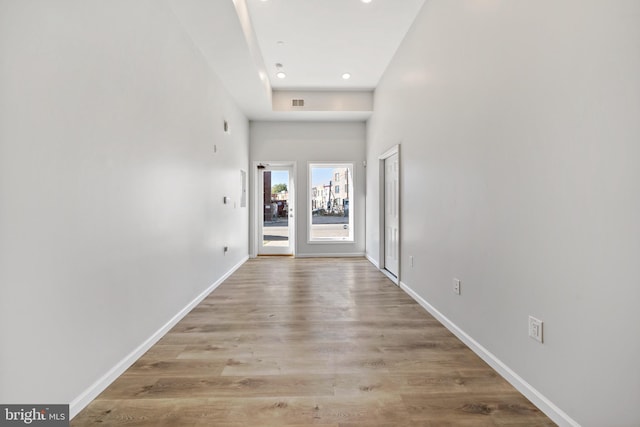 corridor featuring light wood-type flooring