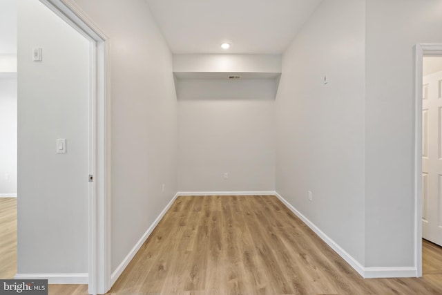 corridor featuring light hardwood / wood-style flooring