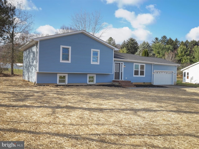 split level home with a garage