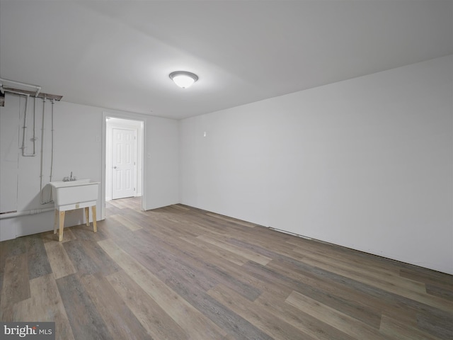 basement featuring light hardwood / wood-style flooring