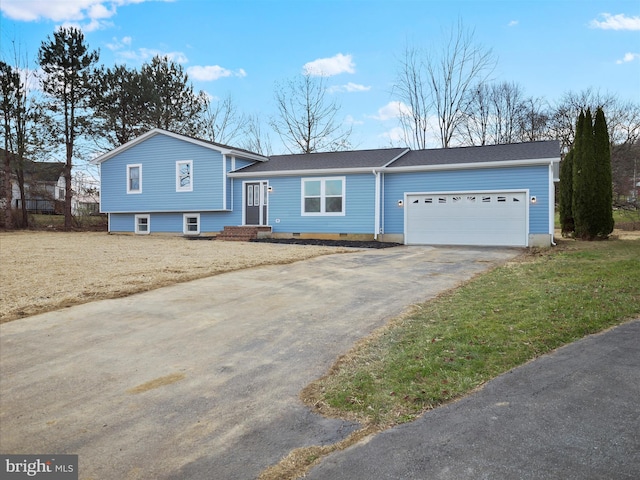 split level home featuring a garage