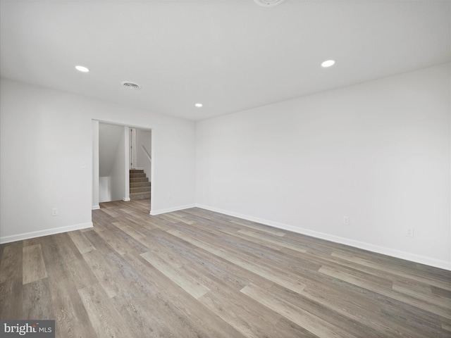 unfurnished room featuring light hardwood / wood-style flooring