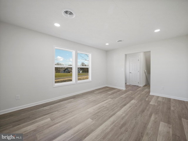 empty room featuring light hardwood / wood-style floors