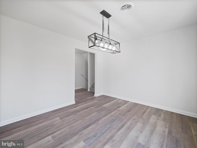 unfurnished dining area featuring light hardwood / wood-style floors