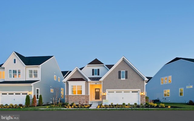 craftsman-style home featuring a garage