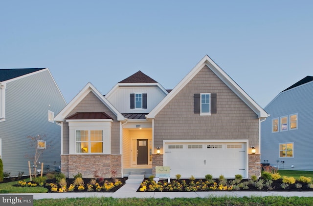 craftsman-style home featuring a garage