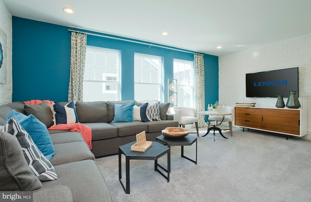 living room featuring light carpet