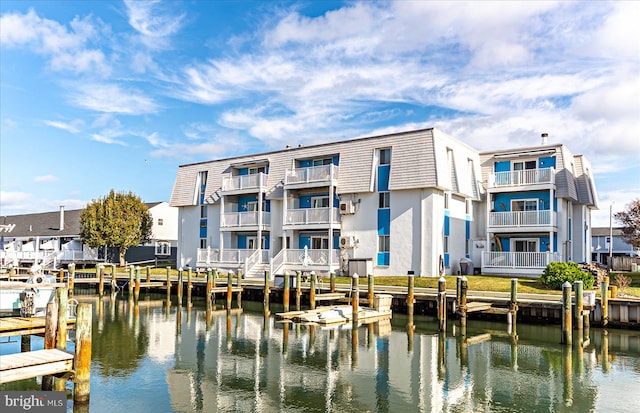 dock area with a water view