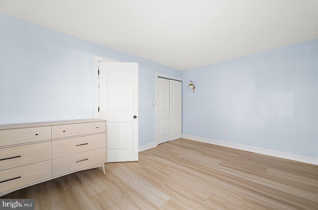 unfurnished bedroom featuring light hardwood / wood-style floors