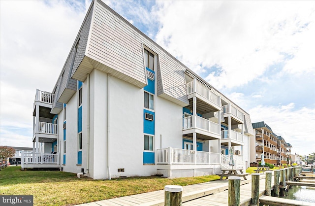 view of building exterior featuring a water view