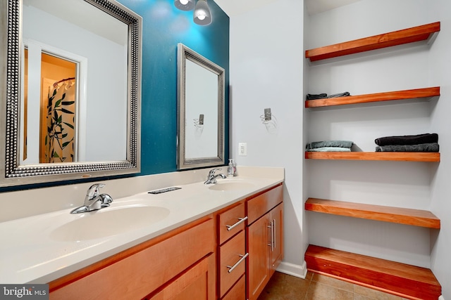 bathroom featuring vanity and tile patterned flooring