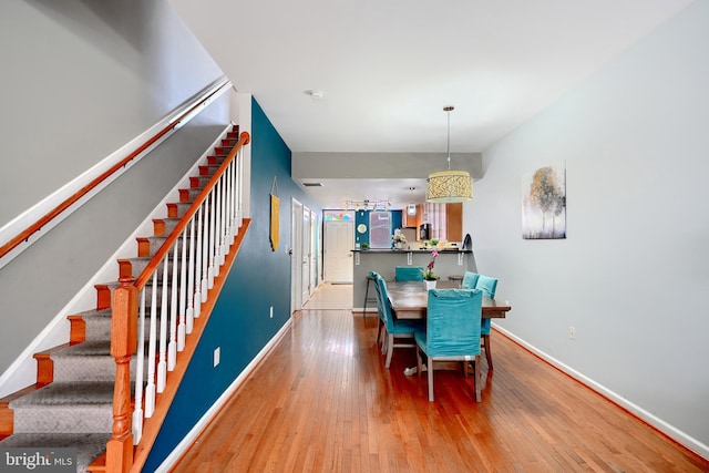 dining room featuring hardwood / wood-style flooring