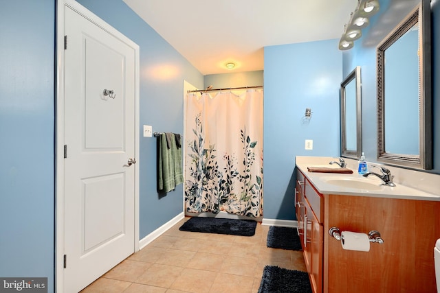 bathroom with vanity and tile patterned floors