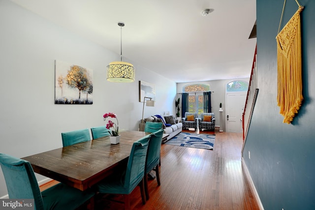 dining room with hardwood / wood-style flooring