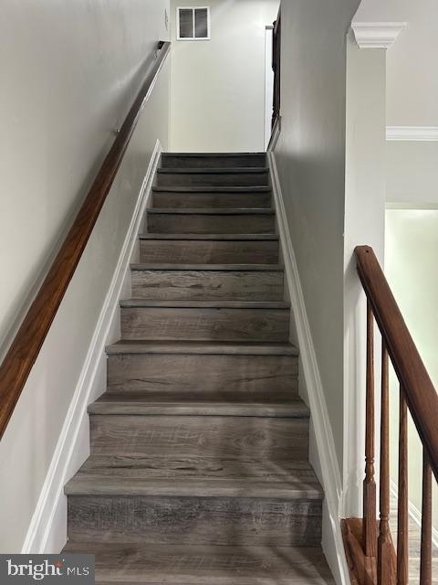 staircase with visible vents