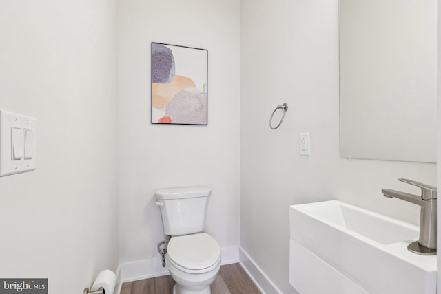 3205 N 35th St Unit 5, Philadelphia, PA 19129 - bathroom with a sink, wood finished floors, baseboards, and toilet