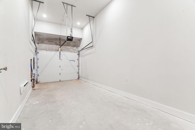 3205 N 35th St Unit 5, Philadelphia, PA 19129 - garage with a garage door opener and recessed lighting