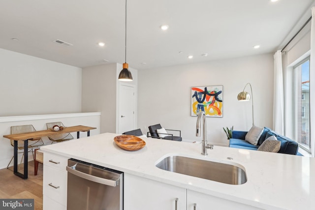 3205 N 35th St Unit 5, Philadelphia, PA 19129 - kitchen featuring dishwasher, a sink, white cabinets, light wood-style floors, and recessed lighting