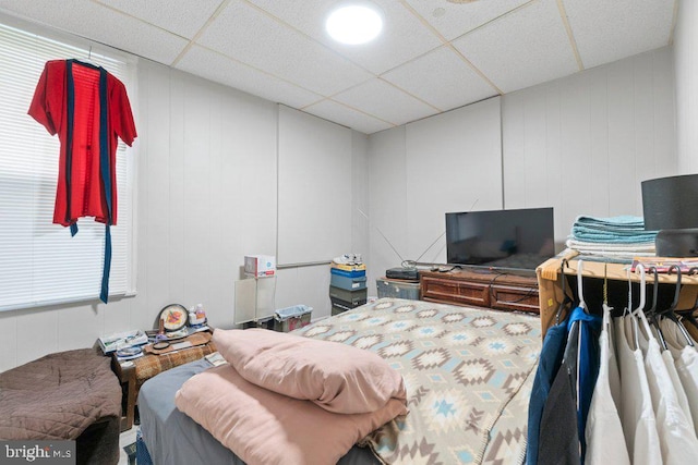 bedroom featuring a paneled ceiling