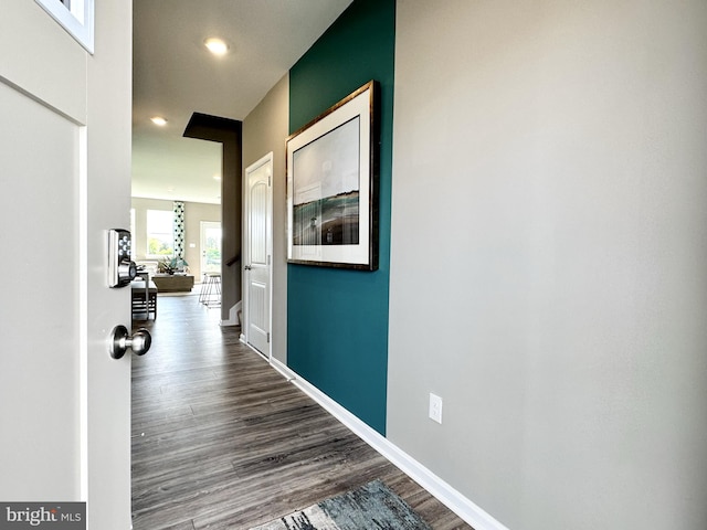 corridor featuring hardwood / wood-style flooring