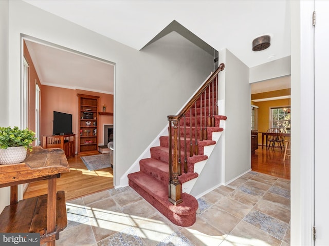 stairway featuring hardwood / wood-style floors