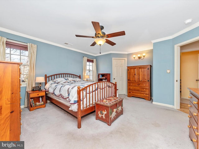 bedroom with crown molding, ceiling fan, and light carpet