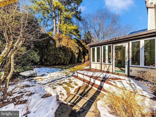 exterior space with a sunroom