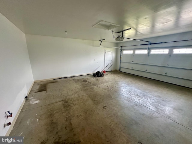 2040 Jelena Rd, Shippensburg, PA 17257 - garage with a garage door opener and baseboards