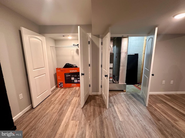 bedroom with wood-type flooring