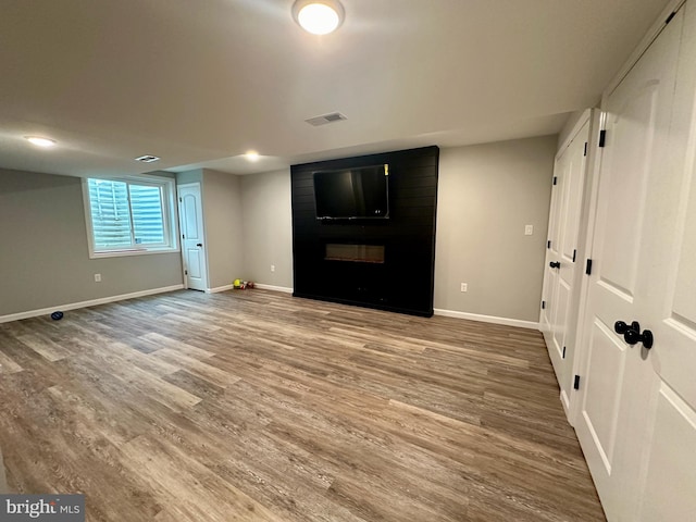 interior space with hardwood / wood-style flooring