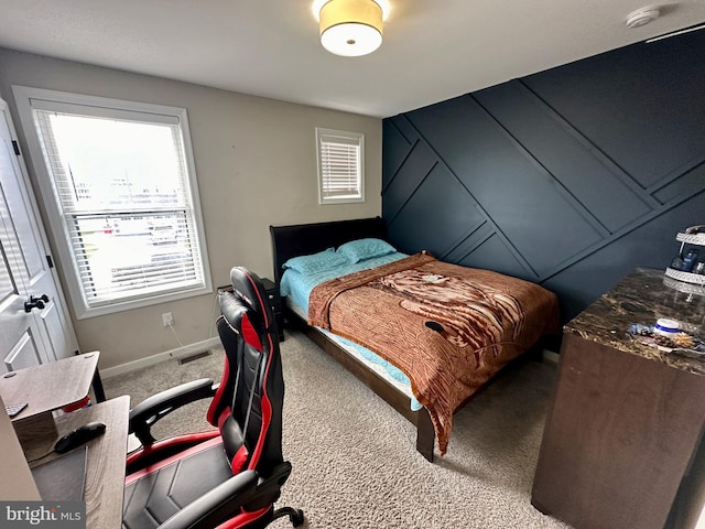 bedroom featuring carpet