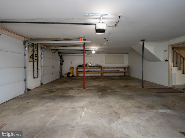 garage featuring a garage door opener