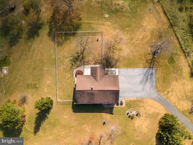 birds eye view of property with a rural view