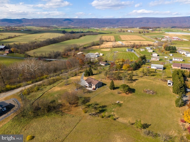 birds eye view of property featuring a rural view