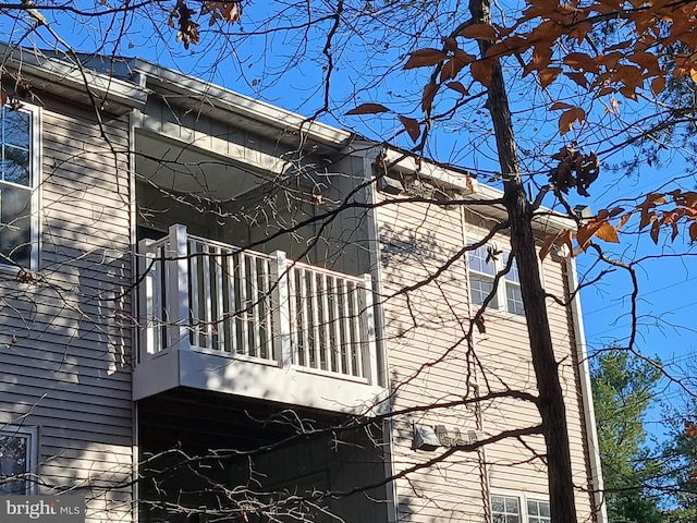 view of property exterior featuring a balcony