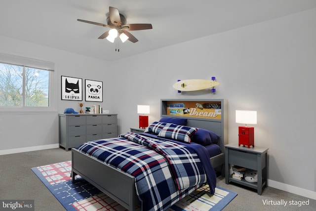 carpeted bedroom featuring ceiling fan