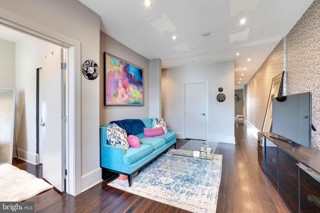 living room featuring dark hardwood / wood-style floors